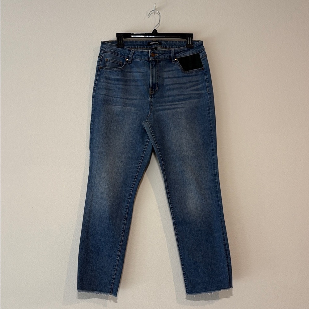 Medium wash jeans with one flannel accent pocket
